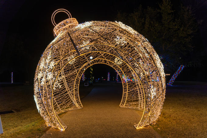 A giant, walk-thru Christmas ornament made of white lights ball